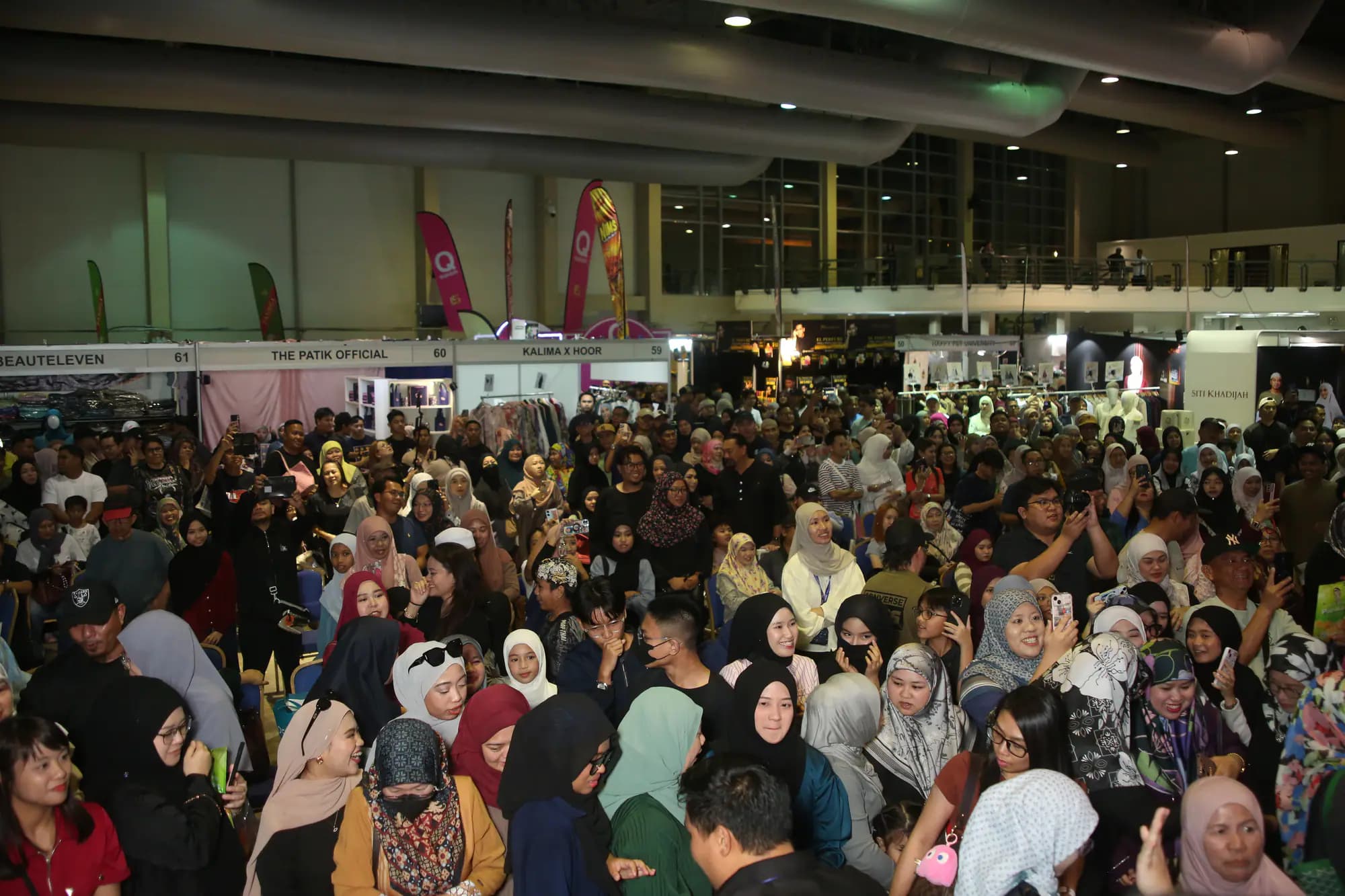 Crowds across the exhibition floor at the Brunei edition
