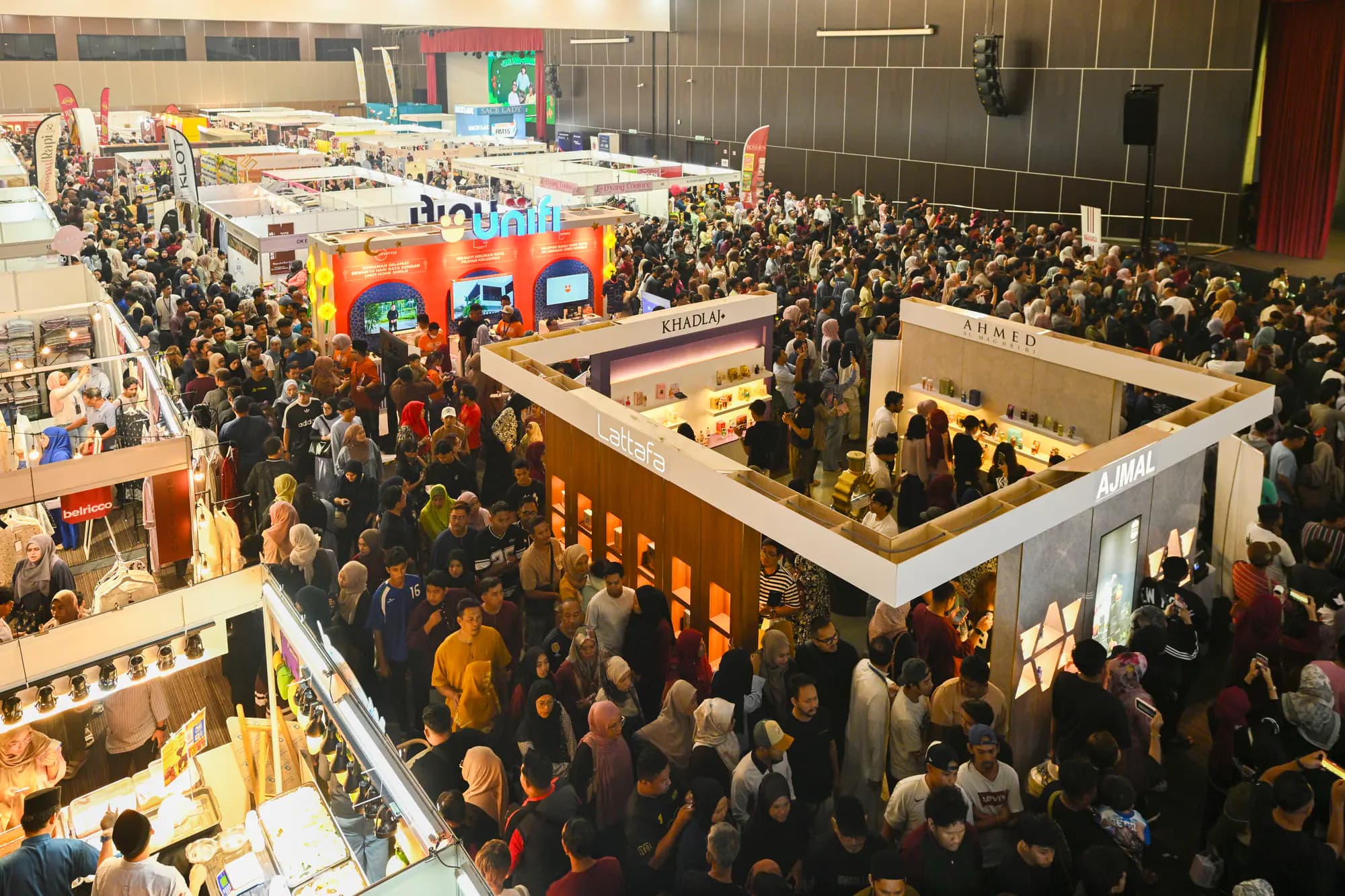 Aerial view of booth aisles packed with visitors at the Penang edition